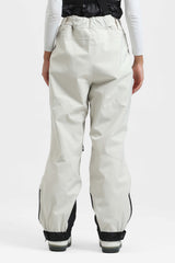 Pantalones de nieve holgados con aislamiento y tirantes desmontables para mujer en color blanco roto 