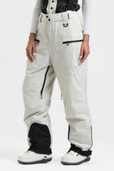 Pantalones de nieve holgados con aislamiento en color azul hielo para mujer con tirantes desmontables 