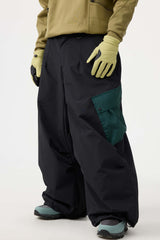 Pantalones de nieve holgados con bolsillos cargo y bloques de color color café para hombre 