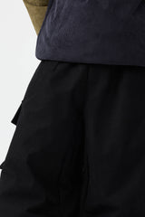 Pantalones de nieve holgados de pana suave y estructurada de color verde oliva para hombre 